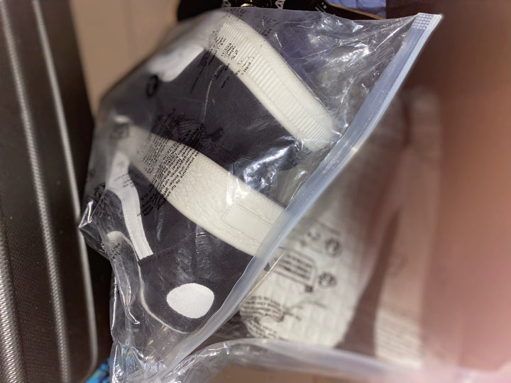 Enfant dormant avec l'oreiller Le P'tit Loup